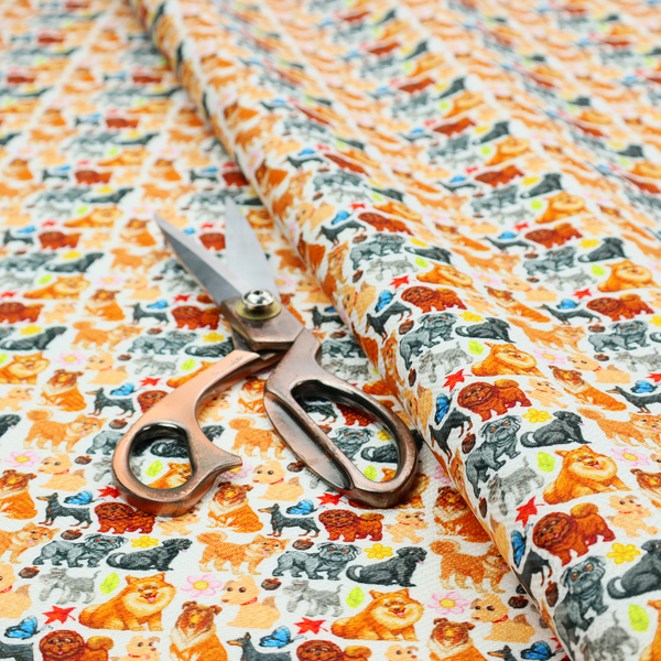 Whimsical fabric pattern featuring a tight, repeating grid of colourful cartoon dogs of various breeds, including Pugs, Chows, and Retrievers, on a light off-white background.