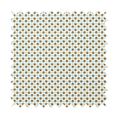 Micro-scale ditsy fabric pattern featuring rows of tiny brown paw prints and beige hearts arranged in a dense polka dot grid on a pale blue background.