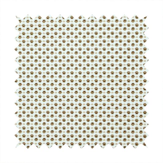 Micro-scale ditsy fabric pattern featuring rows of tiny brown paw prints and beige hearts arranged in a dense polka dot grid on a pale blue background.