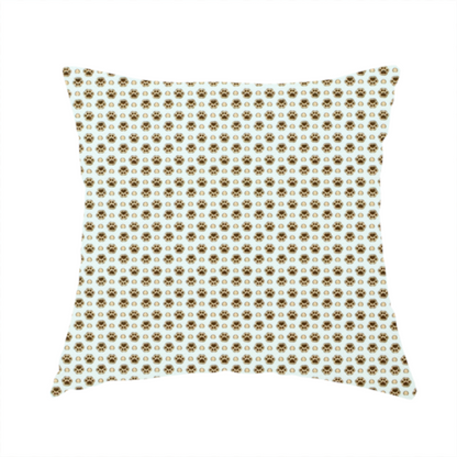 The fabric used to create this handmade cushion is a micro-scale ditsy fabric pattern featuring rows of tiny brown paw prints and beige hearts arranged in a dense polka dot grid on a pale blue background.