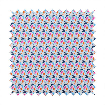 This fabric features a playful, confetti-inspired terrazzo pattern set against a light grey, speckled background.