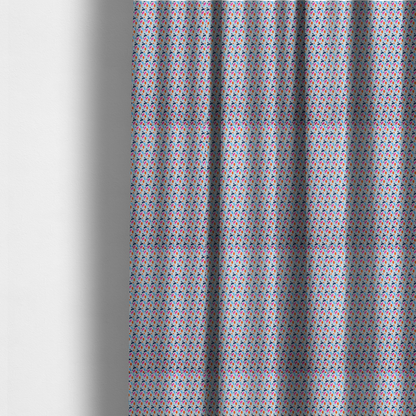The fabric used to create these made-to-measure curtains is a fabric features a playful, confetti-inspired terrazzo pattern set against a light grey, speckled background.