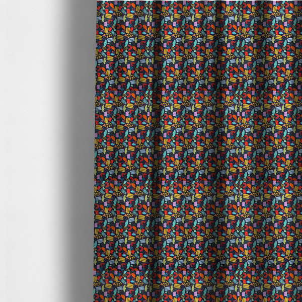 The fabric used to create these made-to-measure curtains is a fabric features a lively, abstract pattern set against a deep navy background. The design is filled with a dense, colourful array of hand-drawn shapes, including squiggles, small arches, and organic blobs in a vibrant palette of yellow, red, orange, teal, light blue, and purple.