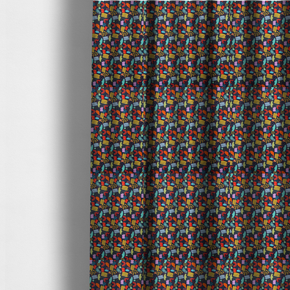 The fabric used to create these made-to-measure curtains is a fabric features a lively, abstract pattern set against a deep navy background. The design is filled with a dense, colourful array of hand-drawn shapes, including squiggles, small arches, and organic blobs in a vibrant palette of yellow, red, orange, teal, light blue, and purple.