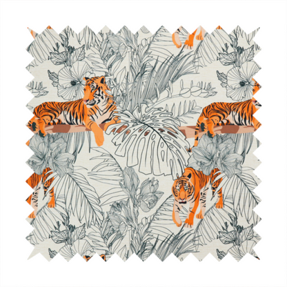 This fabric features a repeating botanical and wildlife pattern set against a light cream and grey background. The design showcases tigers in two poses—some walking and some resting—interspersed with detailed line drawings of large tropical leaves and hibiscus flowers.