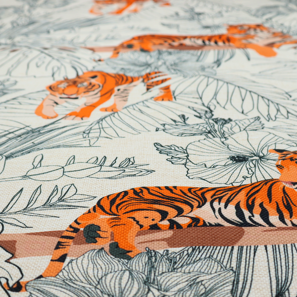 This fabric features a repeating botanical and wildlife pattern set against a light cream and grey background. The design showcases tigers in two poses—some walking and some resting—interspersed with detailed line drawings of large tropical leaves and hibiscus flowers.