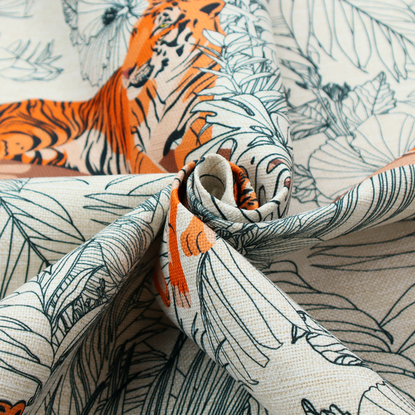 This fabric features a repeating botanical and wildlife pattern set against a light cream and grey background. The design showcases tigers in two poses—some walking and some resting—interspersed with detailed line drawings of large tropical leaves and hibiscus flowers.