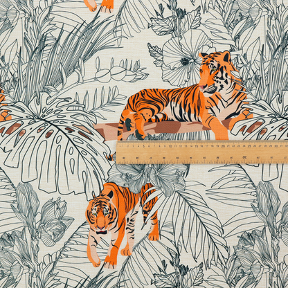 This fabric features a repeating botanical and wildlife pattern set against a light cream and grey background. The design showcases tigers in two poses—some walking and some resting—interspersed with detailed line drawings of large tropical leaves and hibiscus flowers.