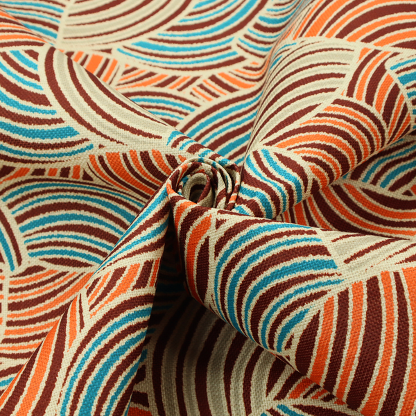 This fabric features a geometric, fan-like pattern composed of overlapping semi-circular arcs. The design creates a dynamic sense of movement through a vibrant colour palette of burnt orange, deep brown, bright turquoise, and cream.
