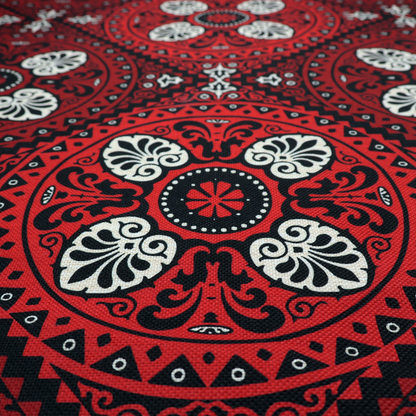 This fabric features an intricate, medallion-style damask pattern with a striking gothic influence. The design is composed of repeating circular motifs containing ornate, symmetrical floral and fan-shaped elements in cream, set against a dark charcoal-black backdrop.