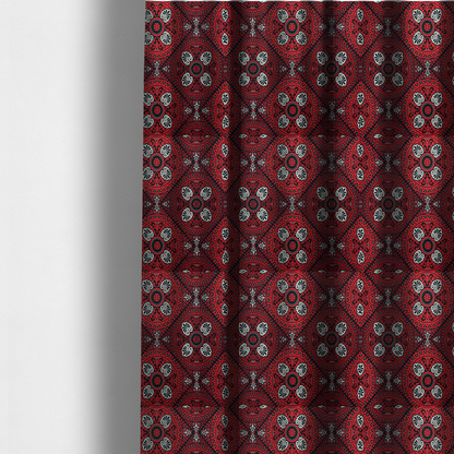 the fabric used to create these made-to-measure curtains is a  fabric features an intricate, medallion-style damask pattern with a striking gothic influence. The design is composed of repeating circular motifs containing ornate, symmetrical floral and fan-shaped elements in cream, set against a dark charcoal-black backdrop.