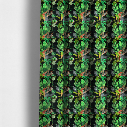 The fabric used to create these made-to-measure curtains is a fabric features a lush, vibrant jungle scene set against a deep black background. The pattern is filled with a dense variety of tropical foliage, including large monstera and palm leaves in multiple shades of green.