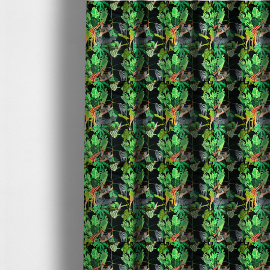 The fabric used to create these made-to-measure curtains is a fabric features a lush, vibrant jungle scene set against a deep black background. The pattern is filled with a dense variety of tropical foliage, including large monstera and palm leaves in multiple shades of green.