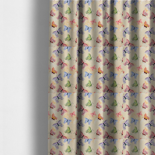 The fabric used to create these made-to-measure curtains is a fabric features a whimsical, repeating pattern of colourful butterflies scattered across a light beige, textured background. The butterflies are rendered in various sizes and a vibrant colour palette, including shades of pink, purple, lime green, and soft blue, with delicate black wing detailing.