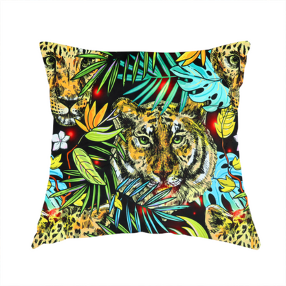 The fabric used to create this handmade cushion is a fabric features a bold, artistic jungle-themed pattern set against a dark black background. The design is a dense, repeating collage of wildlife portraits, featuring alternating heads of leopards and tigers with intense, detailed expressions.