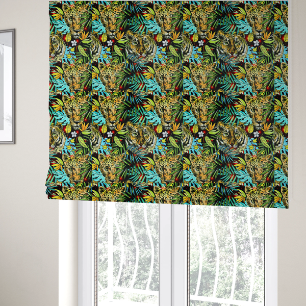 The fabric used to create these Roman blinds is a fabric features a bold, artistic jungle-themed pattern set against a dark black background. The design is a dense, repeating collage of wildlife portraits, featuring alternating heads of leopards and tigers with intense, detailed expressions.