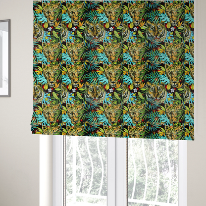 The fabric used to create these Roman blinds is a fabric features a bold, artistic jungle-themed pattern set against a dark black background. The design is a dense, repeating collage of wildlife portraits, featuring alternating heads of leopards and tigers with intense, detailed expressions.