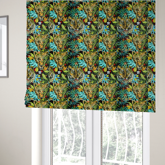 The fabric used to create these Roman blinds is a fabric features a bold, artistic jungle-themed pattern set against a dark black background. The design is a dense, repeating collage of wildlife portraits, featuring alternating heads of leopards and tigers with intense, detailed expressions.