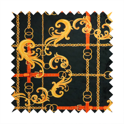 Luxury fashion fabric pattern featuring gold baroque acanthus scrolls layered over a grid of interlocking gold chains and red-orange leather straps on a black background.