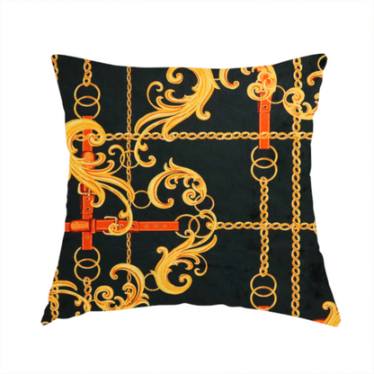 The fabric used to create this handmade cushion is a luxury fashion fabric pattern featuring gold baroque acanthus scrolls layered over a grid of interlocking gold chains and red-orange leather straps on a black background.