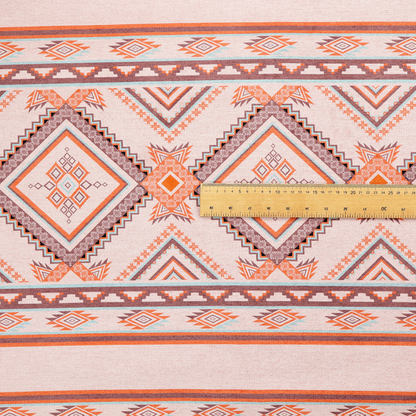 A repeating Southwestern-style fabric pattern featuring geometric diamonds, intricate borders, and horizontal stripes in a palette of coral, turquoise, and earth tones.