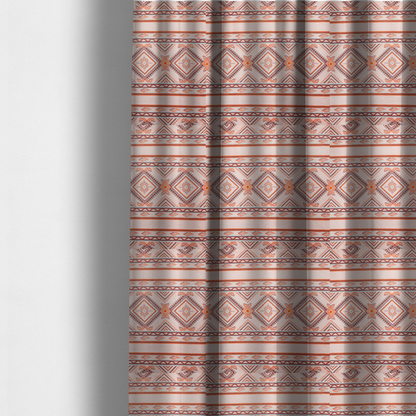 The fabric used to create these made-to-measure curtains is a repeating Southwestern-style fabric pattern featuring geometric diamonds, intricate borders, and horizontal stripes in a palette of coral, turquoise, and earth tones.