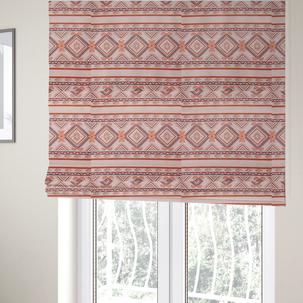 The fabric used to create these Roman blinds is a repeating Southwestern-style fabric pattern featuring geometric diamonds, intricate borders, and horizontal stripes in a palette of coral, turquoise, and earth tones.