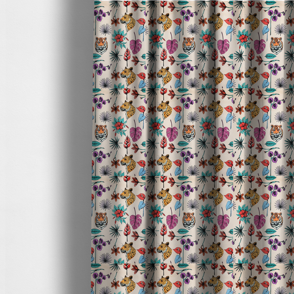 The fabric used to create these made-to-measure curtains is a patterned fabric featuring a repeating design of tiger and leopard heads interspersed with vibrant tropical flowers, orchids, and palm leaves on a cream background.