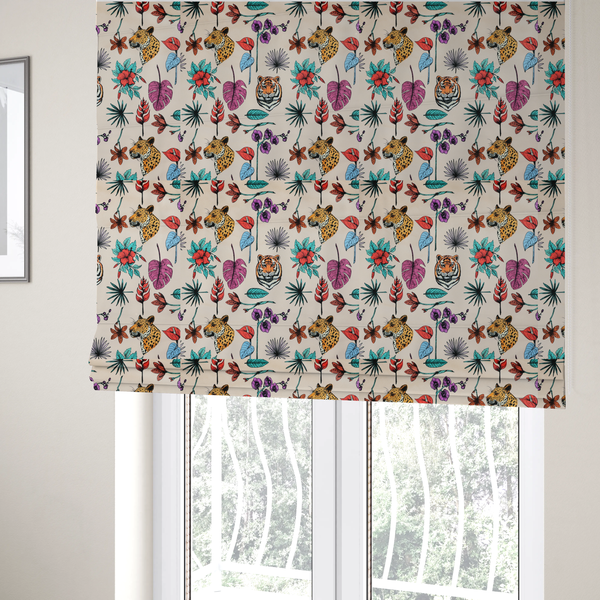 The fabric used to create these Roman blinds is a patterned fabric featuring a repeating design of tiger and leopard heads interspersed with vibrant tropical flowers, orchids, and palm leaves on a cream background.