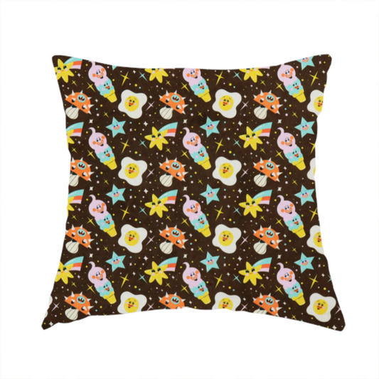 The fabric used to create this handmade cushion is a whimsical, repeating fabric pattern featuring cartoon-style fried eggs, happy ice cream cones, shooting stars, and colourful stars on a dark chocolate brown background.