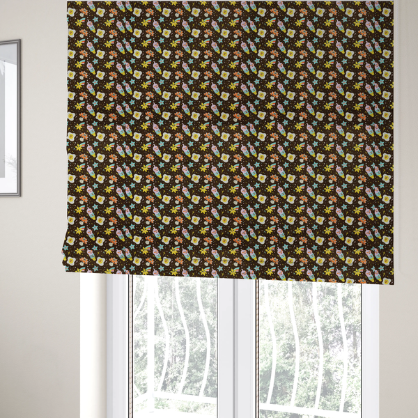 The fabric used to create these Roman blinds is a whimsical, repeating fabric pattern featuring cartoon-style fried eggs, happy ice cream cones, shooting stars, and colourful stars on a dark chocolate brown background.