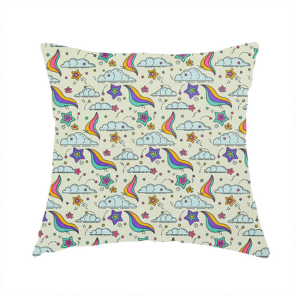 The fabric used to create this handmade cushion is a whimsical, repeating fabric pattern featuring illustrated clouds, colourful shooting stars, and twinkling stars on a light cream background.