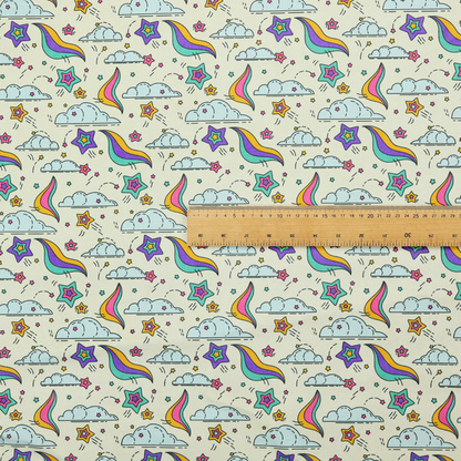 A whimsical, repeating fabric pattern featuring illustrated clouds, colourful shooting stars, and twinkling stars on a light cream background.