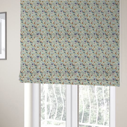 The fabric used to create these Roman blinds is a whimsical, repeating fabric pattern featuring illustrated clouds, colourful shooting stars, and twinkling stars on a light cream background.
