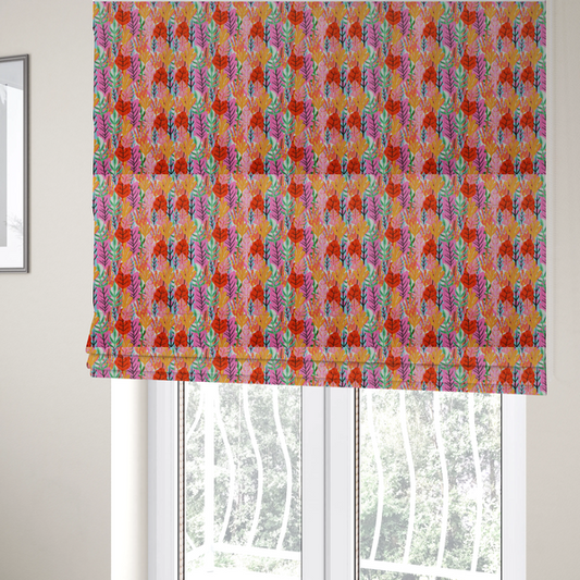 The fabric used to create these Roman blinds is a vibrant, repeating textile pattern featuring a dense arrangement of stylized tropical leaves in saturated shades of pink, orange, yellow, and bright green against a white background.
