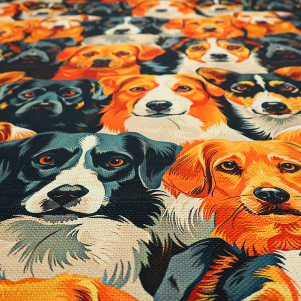 Vibrant fabric pattern featuring a dense, repeating arrangement of detailed, illustrated dog portraits of various herding breeds in bold orange, black, and cream colours.