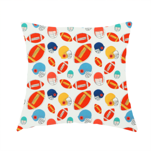 The fabric used to create this handmade cushion is a clean white fabric featuring a playful, repeating pattern of American footballs and helmets.