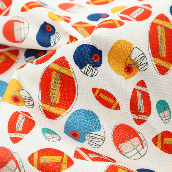 A clean white fabric featuring a playful, repeating pattern of American footballs and helmets.