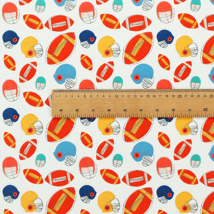 A clean white fabric featuring a playful, repeating pattern of American footballs and helmets.