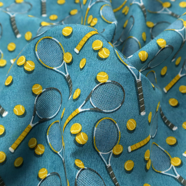 a cool medium-blue fabric featuring a structured, repeating tennis pattern.
