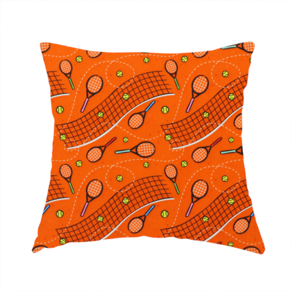 The fabric used to create this handmade cushion is a vibrant burnt orange fabric featuring a dynamic, repeating tennis-themed pattern.