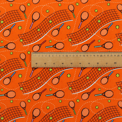 a vibrant burnt orange fabric featuring a dynamic, repeating tennis-themed pattern.