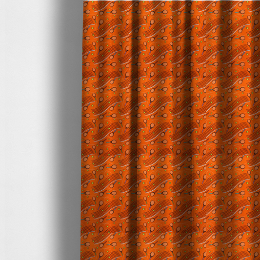 The fabric used to create these made-to-measure curtains is a vibrant burnt orange fabric featuring a dynamic, repeating tennis-themed pattern.