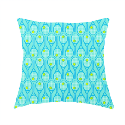The fabric used to create this handmade cushion is a bright turquoise fabric featuring a structured, repeating tennis pattern.