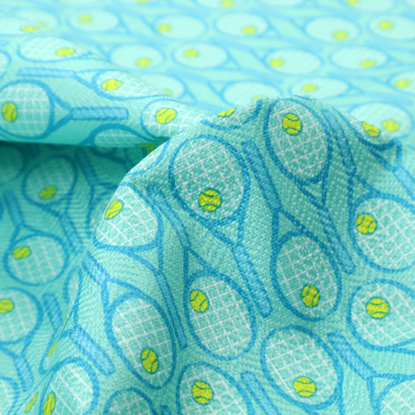 A bright turquoise fabric featuring a structured, repeating tennis pattern.
