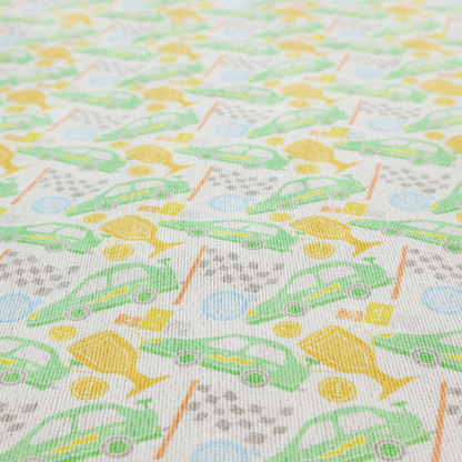 A soft white fabric featuring a charming, repeating racing-themed pattern in a pastel colour palette.