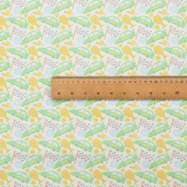 A soft white fabric featuring a charming, repeating racing-themed pattern in a pastel colour palette.
