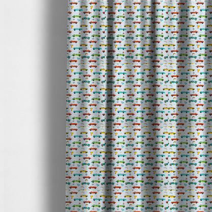 The fabric used to create these made-to-measure curtains is a fabric featuring a whimsical, repeating pattern of vintage-style racing cars and track accessories.