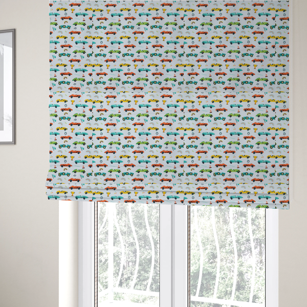 The fabric used to create these Roman blinds is a fabric featuring a whimsical, repeating pattern of vintage-style racing cars and track accessories.