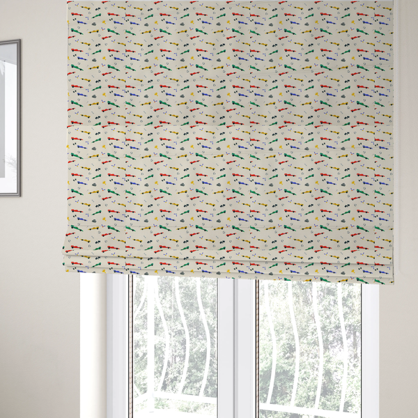 The fabric used to create these Roman blinds is a cream-coloured fabric featuring a detailed, repeating pattern of Formula 1-style racing cars and track elements.
